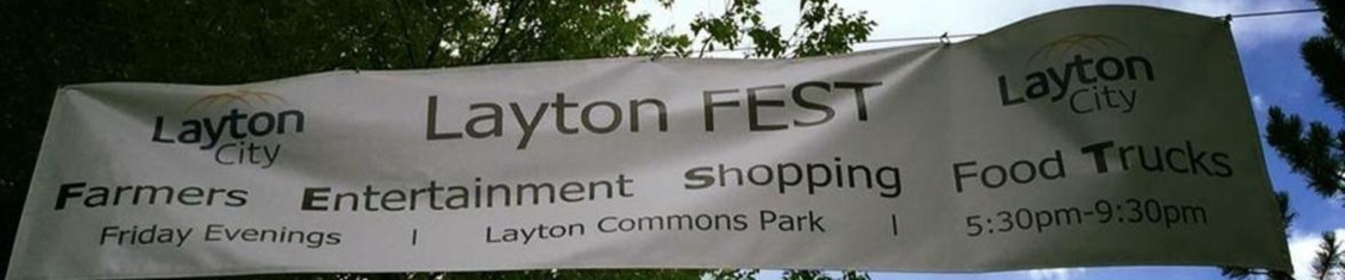 Layton Fest banner showing acronym of Food, Entertainment, Shopping, and Food Trucks